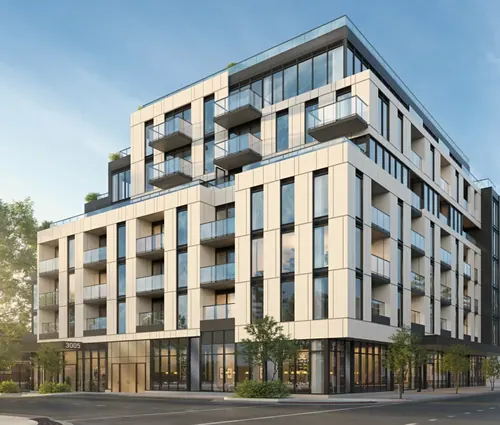 Mid-rise multi-residential building with balconies on an urban corner in Ontario